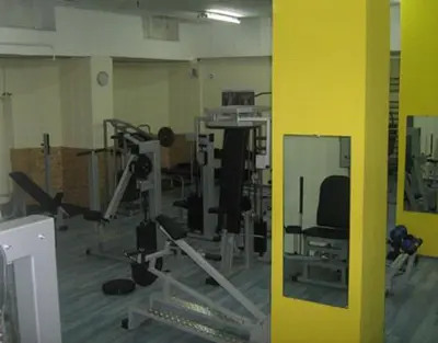 a room with a gym with lots of equipment at Top Place in Downtown in Sofia