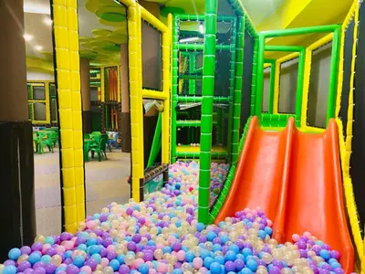 a large pile of balls on a playground at Hotel Orpheus in Pamporovo