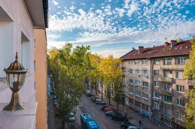 a view of a city street with buildings and a street light at Unique atmosphere with golden standard design in Sofia