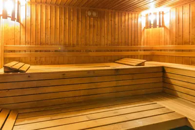 a wooden sauna with a large wooden tub at Eco Hotel Zdravetz in Tsar Kaloyan