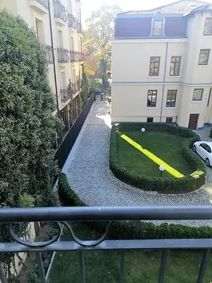 a view from a balcony of a building with a golf course at Portofino Apartment in Sofia