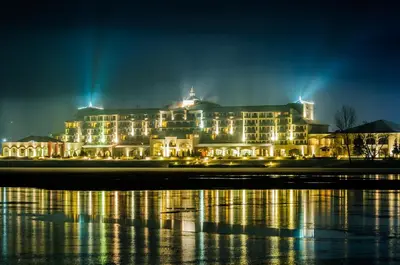 a large building is lit up at night at Hyatt Regency Pravets Resort in Pravets