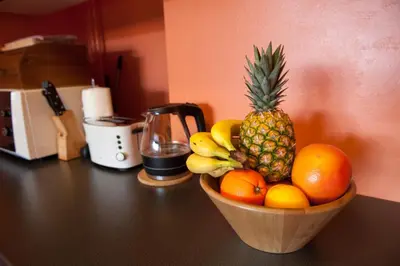 a bowl of fruit on top of a counter at Studio 5 Corners in Sofia