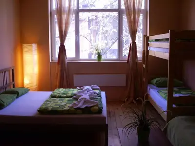a bedroom with two bunk beds and a window at Elegance on a Budget - Rooms for Rent in Sofia Center in Sofia