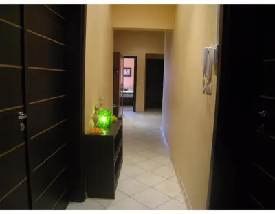 a hallway with a hallway leading to a room at Elegance on a Budget - Rooms for Rent in Sofia Center in Sofia