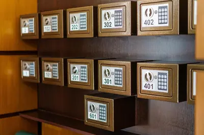 a row of alarm clocks on a shelf at Hotel Avion - Self check in in Plovdiv
