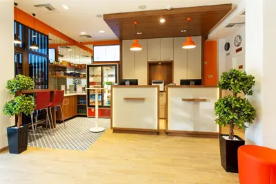 a lobby of a store with potted plants at Best Western Terminus Hotel in Sofia