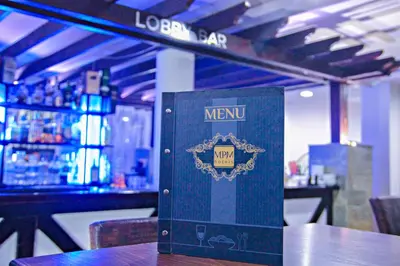 a box sitting on top of a table in a bar at MPM Hotel Guinness in Bansko