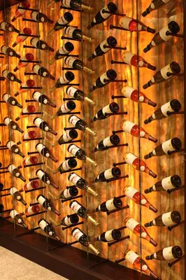 a wine rack with a bunch of wine bottles at Casa Boyana Boutique Hotel in Sofia