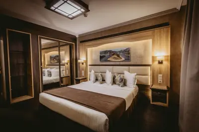 a bedroom with a large bed in a room at Hotel ZOO Sofia in Sofia