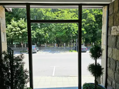 an open window with a view of a parking lot at Gardenia Park Hotel in Bansko