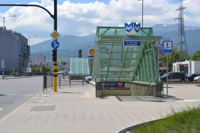 a bus stop on the side of a city street at Elate Plaza Hotel in Sofia