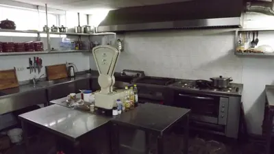 a kitchen with a table with a mixer on it at Villa Filip in Bachevo