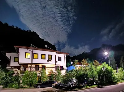 a house at night with a street light at Хотел Свети Трифон in Melnik