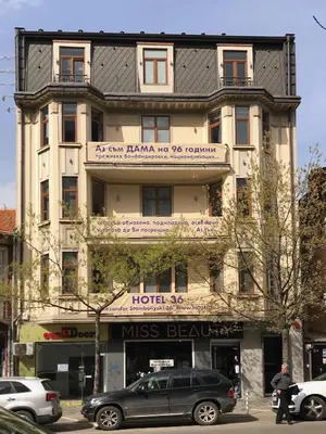 a black car parked in front of a building at Design Hotel 36 in Sofia