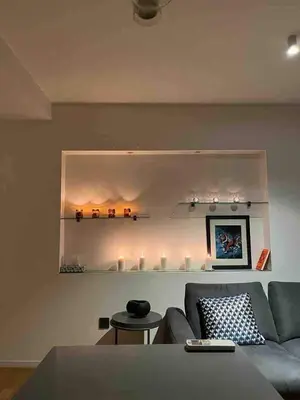 a living room with a couch and a table at Lozenets Executive Apartment with Private Parking in Sofia