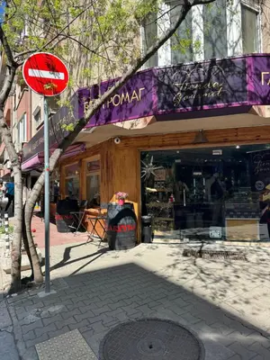 a red stop sign in front of a store at Parchevich 31 Center Apartment - 24h Self Check-in in Sofia
