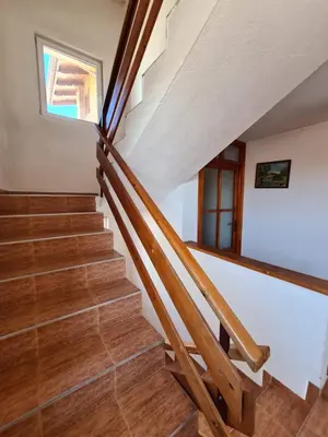 a staircase in a house with a window at Villa Mura in Razlog