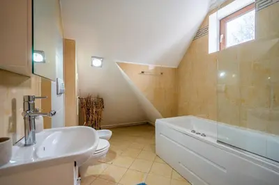 a bathroom with a sink and a toilet and a shower at RENOVATED Boutique Apartments Petrus in Sofia