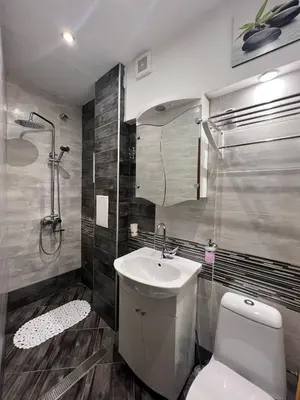 a bathroom with a toilet and a sink and a shower at Budapest Central Cozy Studio w Working Space and WiFi in Sofia