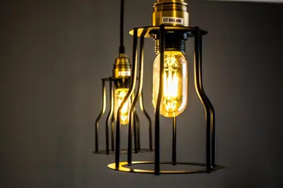 a group of lights hanging from a ceiling at The Dutchies' apartment in Plovdiv