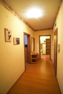 a hallway of a room with a hard wood floor at Apartment Geo Milev in Plovdiv