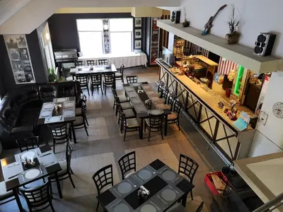 an overhead view of a restaurant with tables and chairs at Papa Moose Pamporovo in Pamporovo