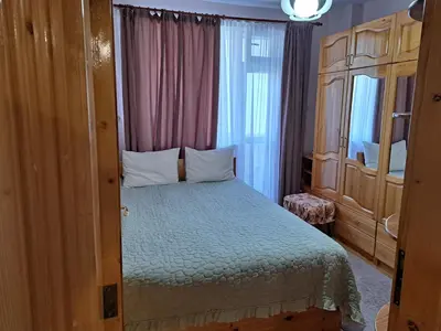 a bedroom with a bed and a window at Apartment Beti in Devin