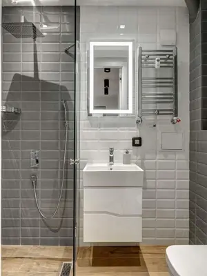a bathroom with a sink and a shower at Apartment Rotonda in Sofia