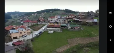an aerial view of a small village with houses at Къща за гости Чала in Chala