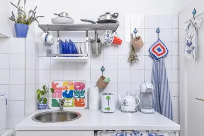 a kitchen counter with a sink and utensils at Shik & Chic One Bedroom Central Apartment Graf Ignatiev x Shishman Corner by Flat Mаnager in Sofia