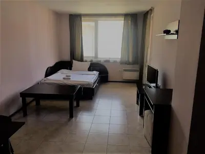 a small room with two beds and a window at Maria-Antoaneta Residence in Bansko