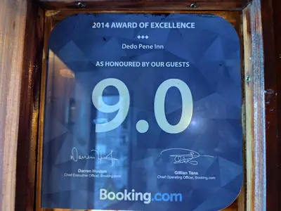 a poster for the auction of excellence at Dedo Pene Inn in Bansko