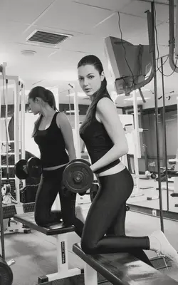 two women standing on a bench in a gym at Molerite Complex in Bansko
