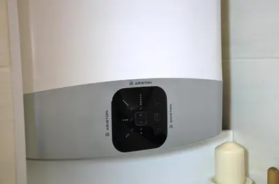 a microwave oven sitting on top of a wall at Lux Apartment in Pazardzhik