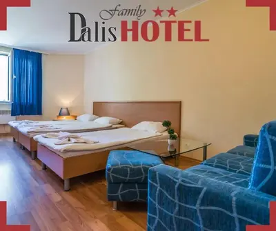 a hotel room with two beds and a couch at Family Hotel Dalis in Sofia