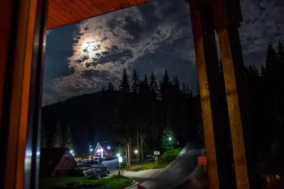 a view from a window of a skate park at night at Апартаменти Малина in Pamporovo