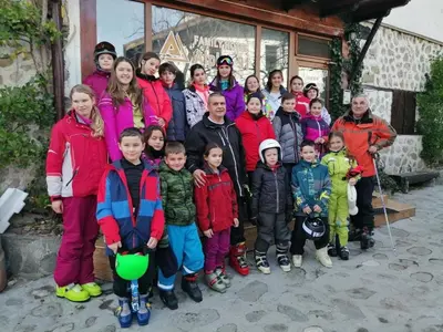 a large group of people posing for a picture at Hotel Alpin - 91 Bansko in Bansko