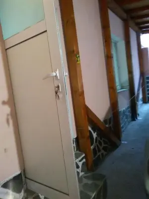 a door in a room with a staircase at ИВАНЕЛИ in Sapareva Banya
