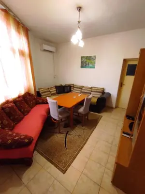 a living room with a couch and a table at relax in Plovdiv