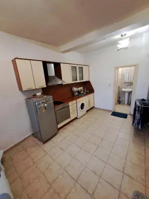 a kitchen with a stove and a sink in it at relax in Plovdiv