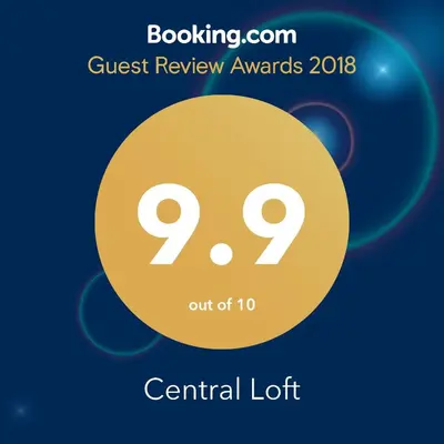 a yellow circle with the text quest review awards central lot at Central Loft in Plovdiv