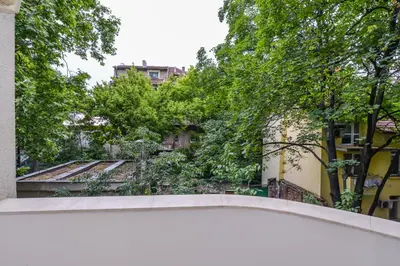 a view from the roof of a building with trees at The Charming Home - One Bedroom TOP Central Apartment by Flat Mаnager in Sofia