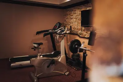 a room with a home gym with a machine at Royal Park Hotel by Astoria Collection in Bansko