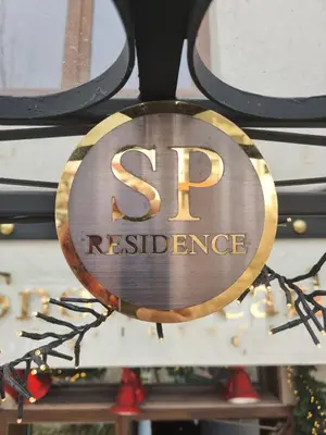 a sign that reads sr resilience hanging from a ceiling at Snow Pearl Residence & FREE SPA in Bansko
