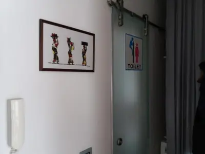a room with a framed picture on the wall at Bright apartment at a great location in Sofia