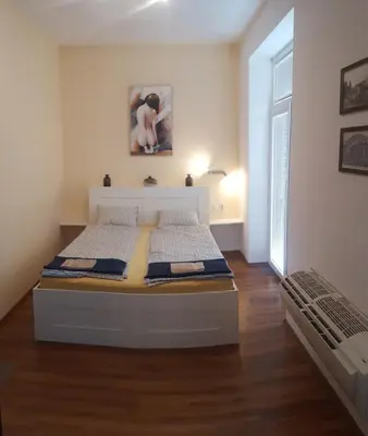 a bedroom with a bed in a room at Studio Cathlyn in Sofia