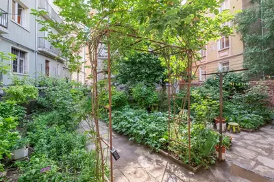 a garden in the middle of a building at Sofia Center Cave in Sofia