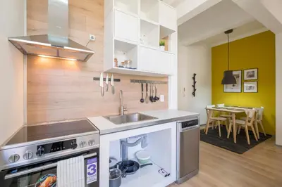 a kitchen with a sink and a stove at blueWaveplace - Contemporary Home in Center of Sofia in Sofia