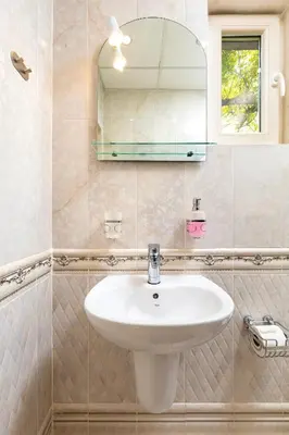 a bathroom with a sink and a mirror at Blacksmith's House - Old Town in Plovdiv